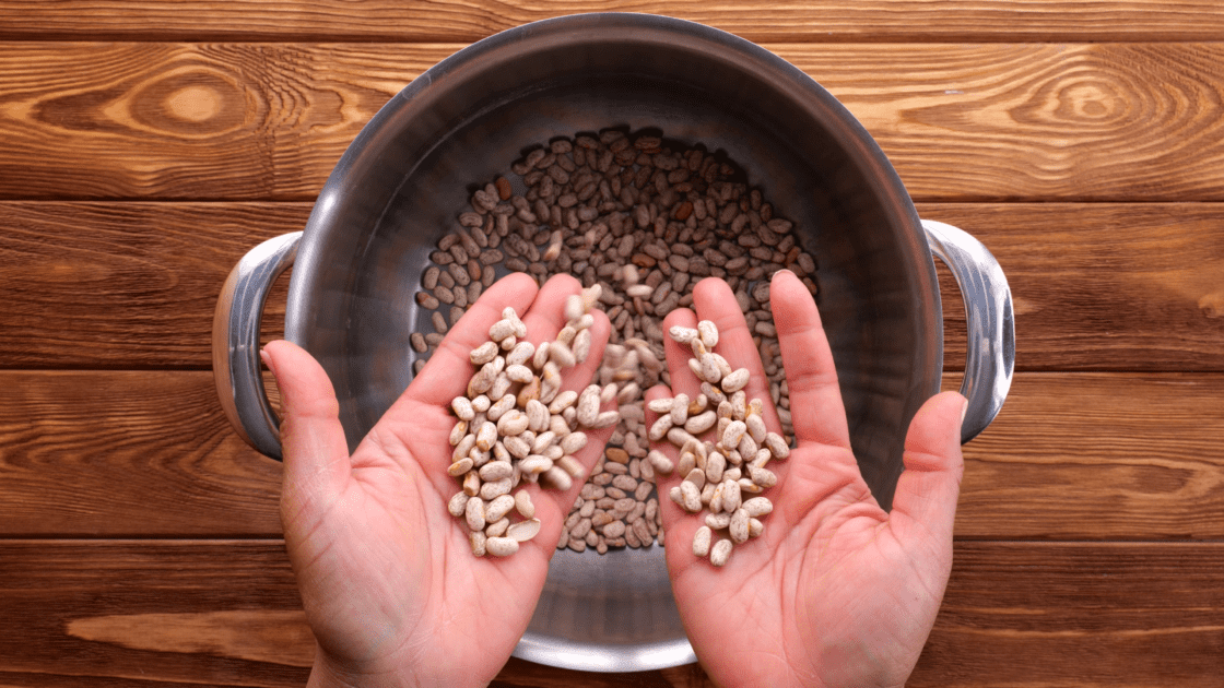 Sort dried beans before placing in large pot.