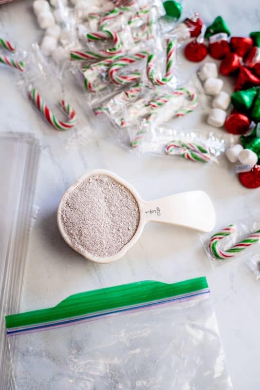 Add hot chocolate mix to zipper seal bag.