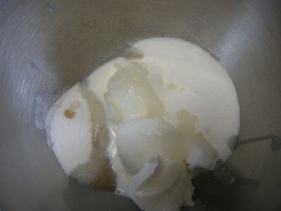 Combine sugar, shortening, milk, and vanilla in a mixing bowl.