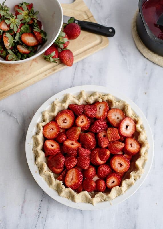 Layer strawberries in Homemade Pie Crust