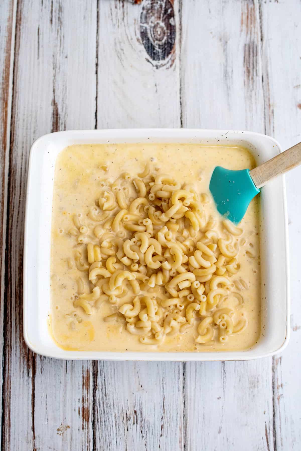 pour the drained macaroni into the Velveeta mac and cheese sauce and stir.
