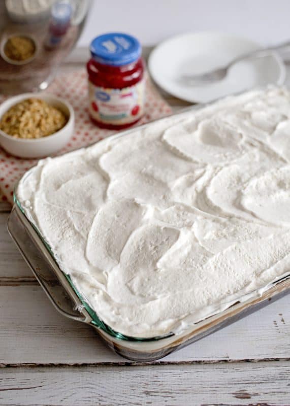 Cover cake in whipped topping.