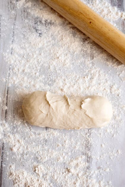 Place thawed dough on floured surface.