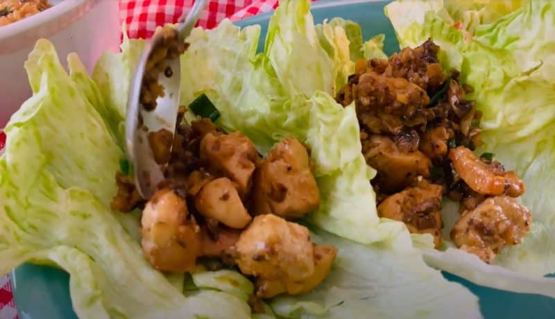 Place chicken into lettuce wraps.