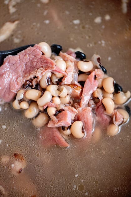 Bring black eyed peas and ham to a boil and them simmer for a few hours.