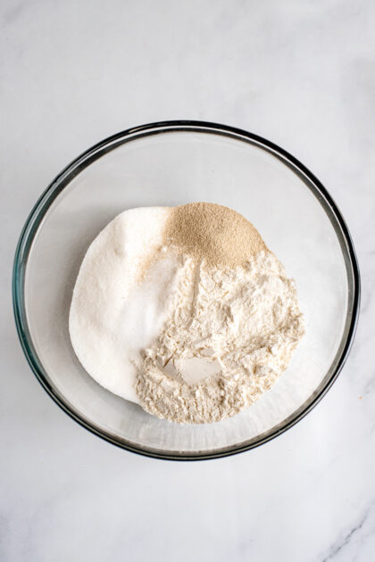 Measure dry ingredients into a mixing bowl.