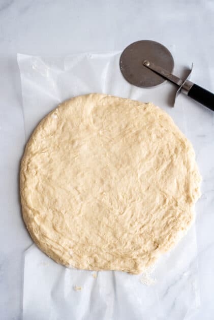 Knead dough into a circle.