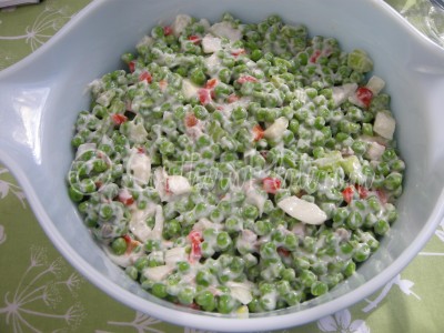 Add green pea casserole ingredients to a casserole dish.