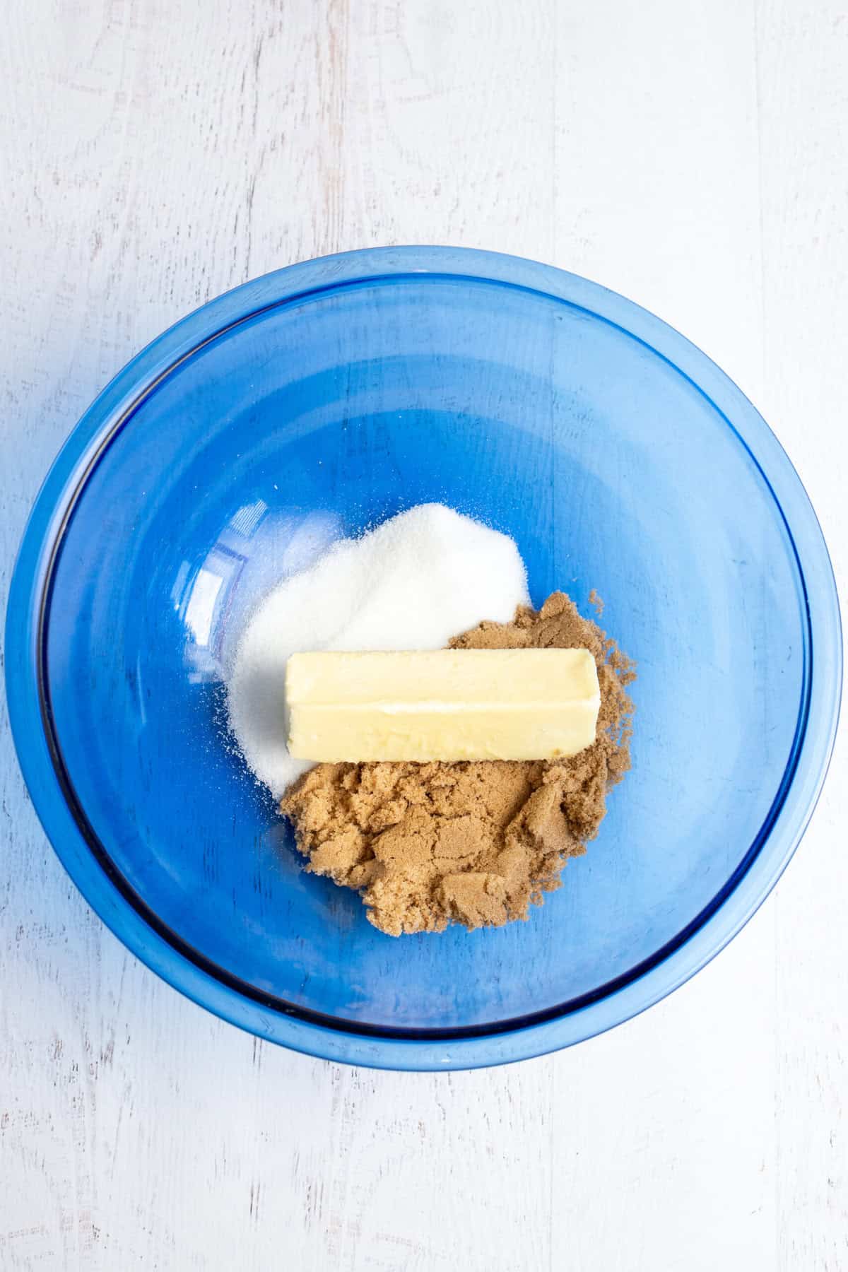 place sugars and butter in a mixing bowl