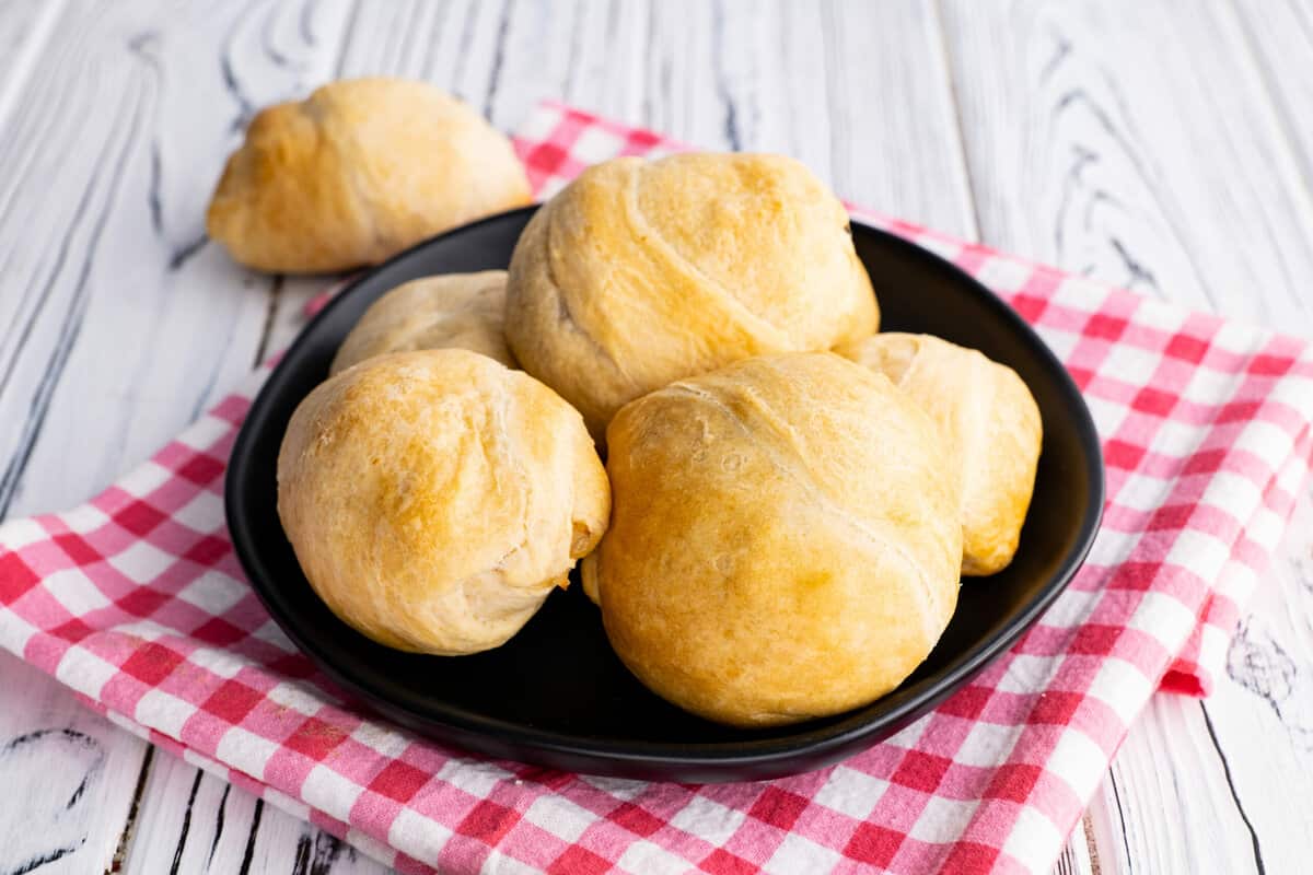 Crescent roll meat pies on plate.