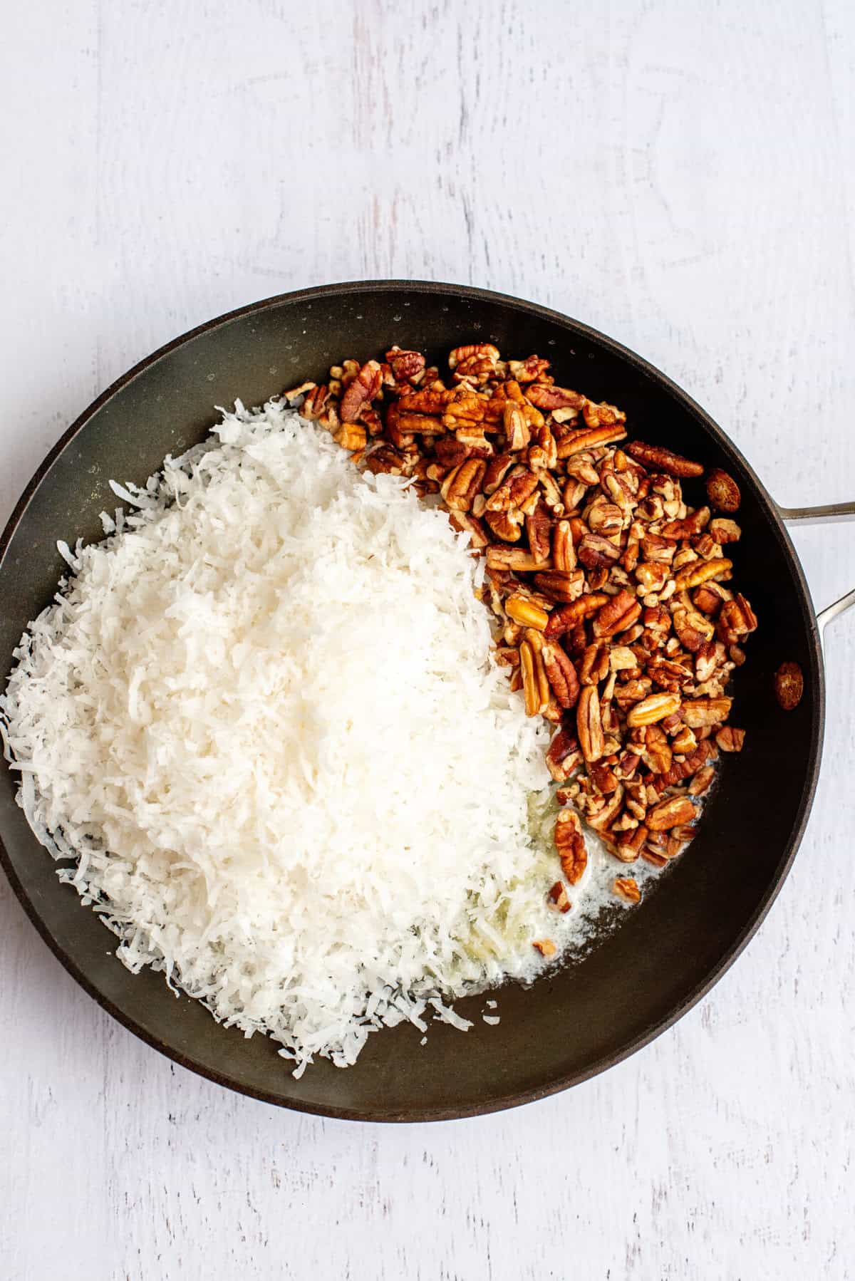 add in the shredded coconut and chopped pecans