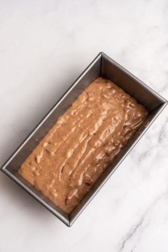 Pour batter into loaf pan.