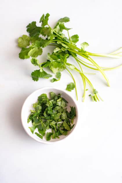 Chop fresh cilantro.