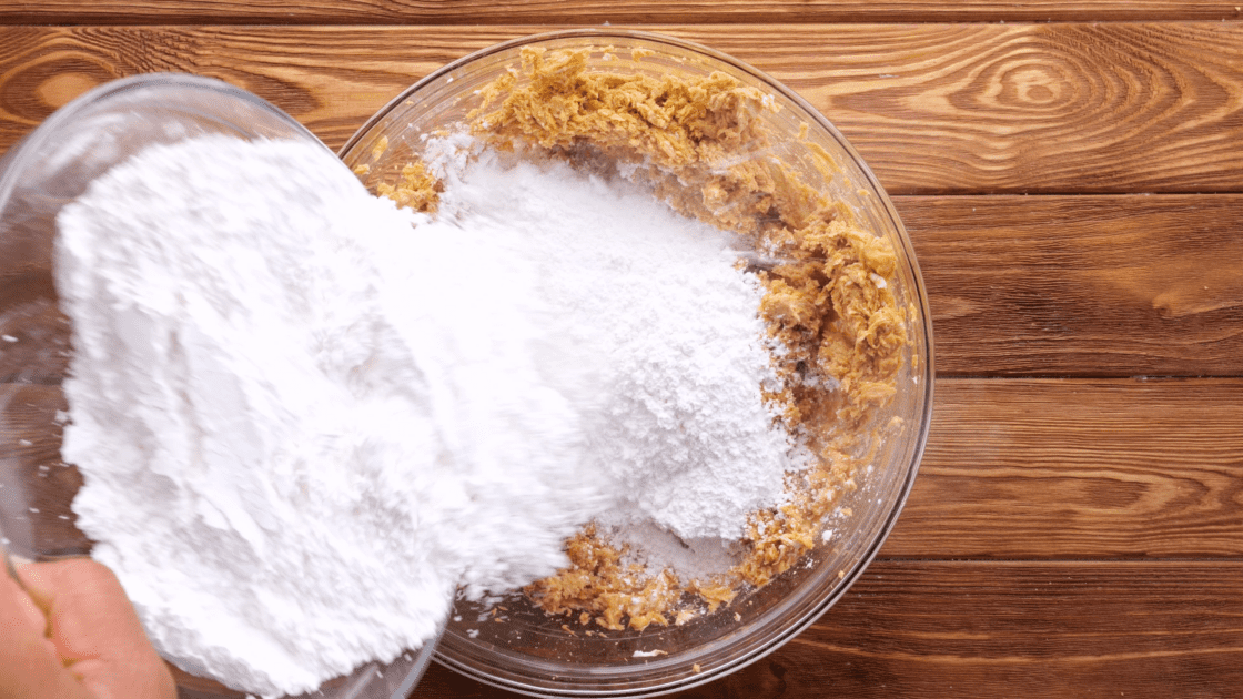 Add powdered sugar to mixing bowl.