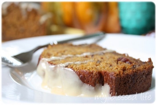 pumpkin cranberry bread slice with caramel glaze.