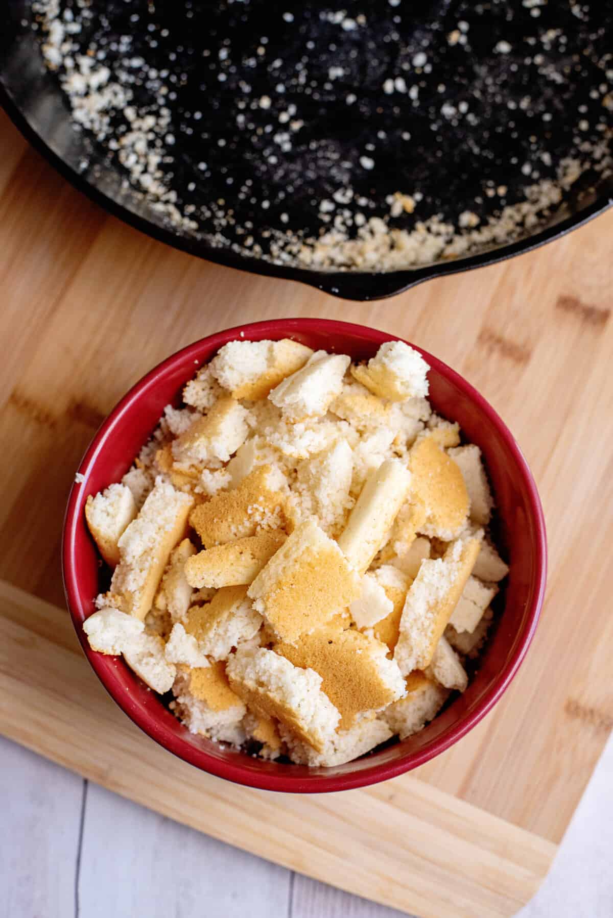 chop baked cornbread into small pieces