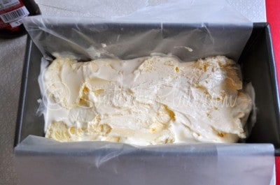 Spread 1/3 of your ice cream into the bottom of the loaf pan.