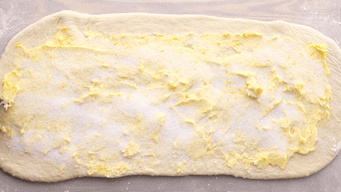 Sprinkle dough with sugar.