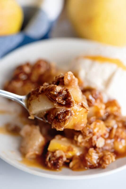 Spoonful of pear crisp.