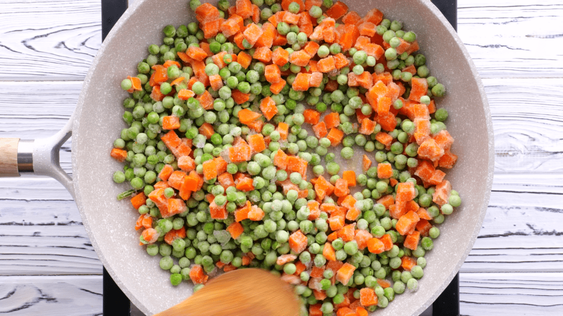 Cook frozen vegetables in skillet.