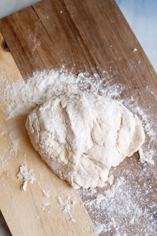 Dump stuffed pizza crust batter onto floured surface