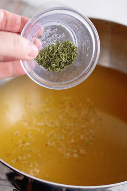 Add dried parsley to stockpot.