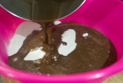Add chocolate mixture to flour/sugar mixing bowl.