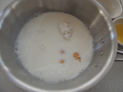 Place milk, flour, sugar, and eggs in a saucepan.