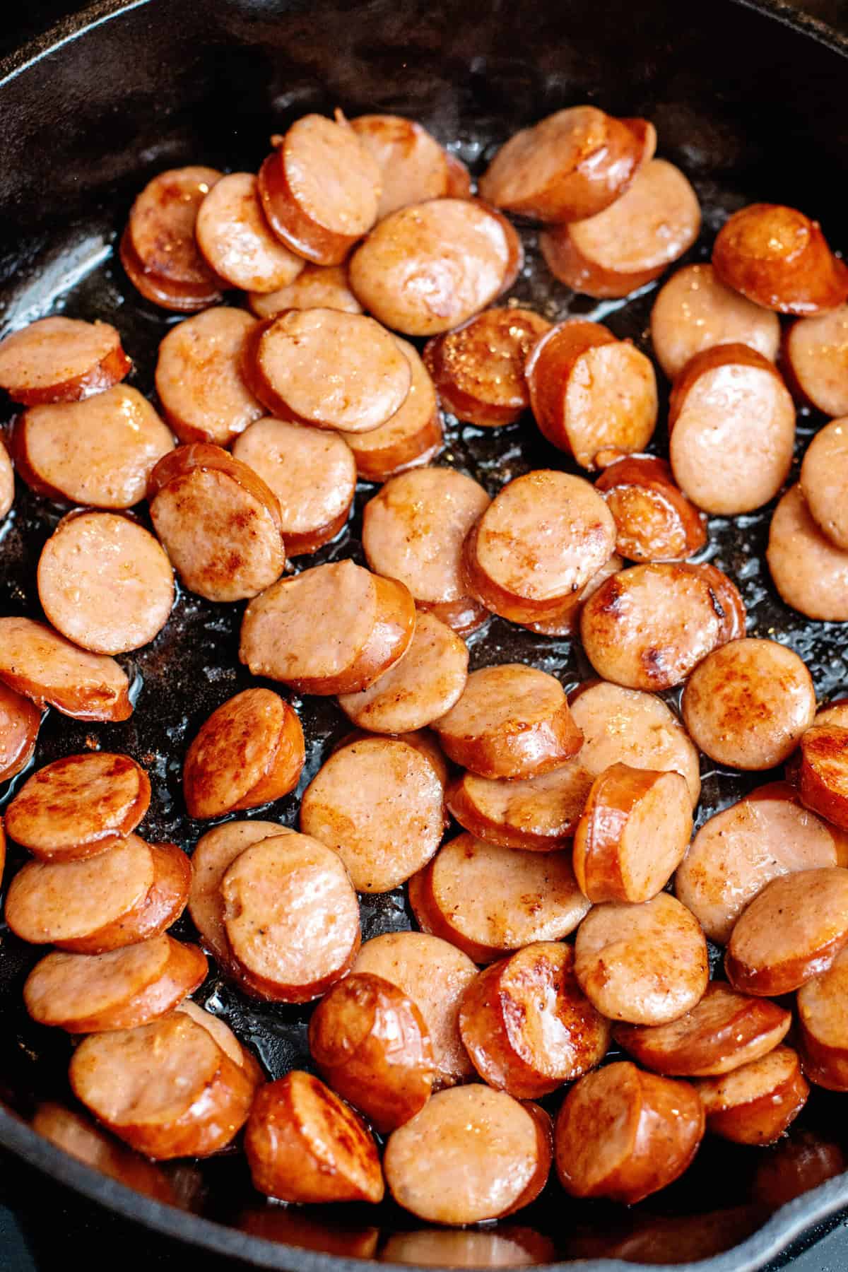 brown sausage in a skillet