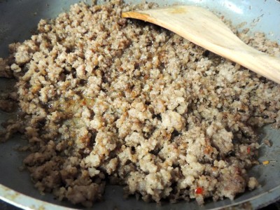 Brown sausage in skillet.