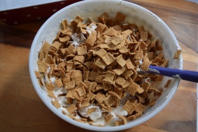 Add Golden Grahams to bowl.