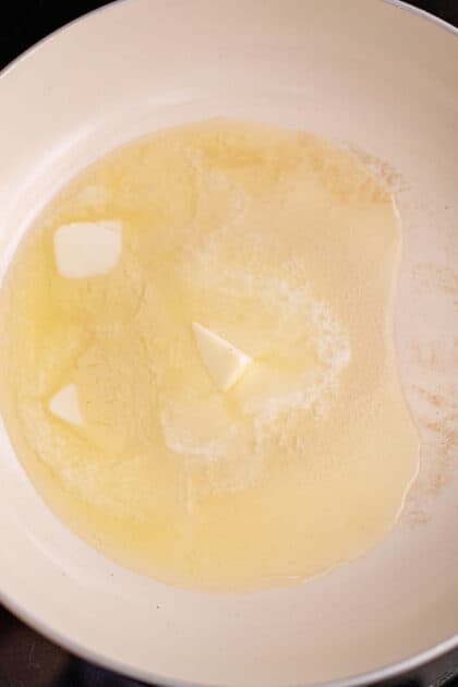 Melt butter in skillet.