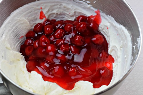 Stir in cherry pie filling by hand.