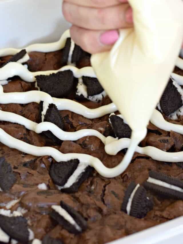 cropped-drizzling-Oreo-Stuffed-Brownies.jpg