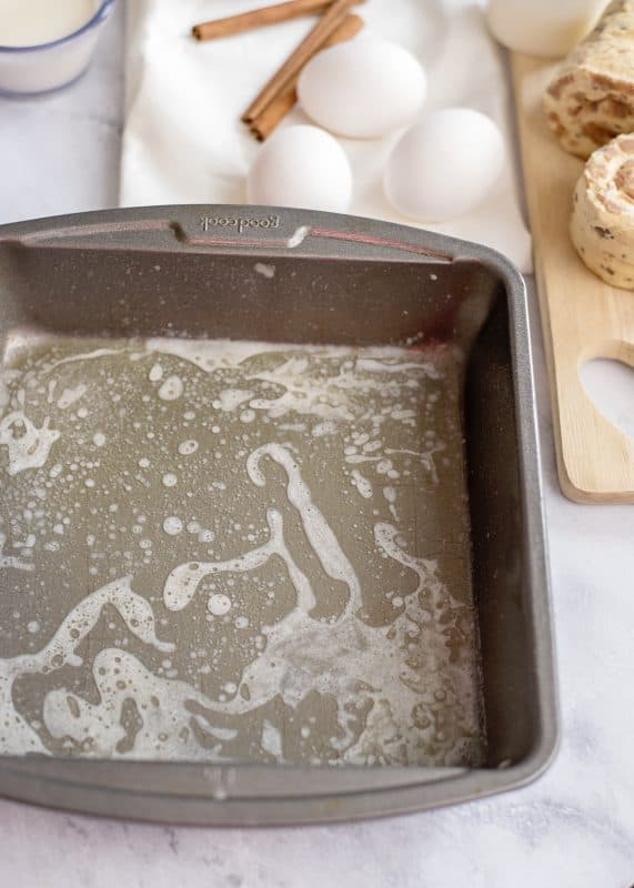 Melt butter and place it in the bottom of an 8x8 baking dish.