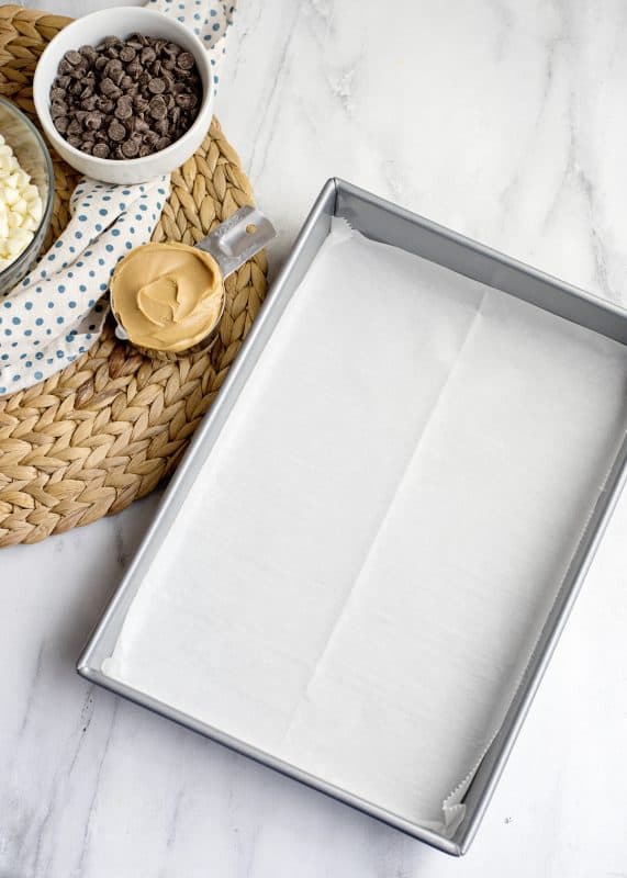 prepping pan with parchment paper 