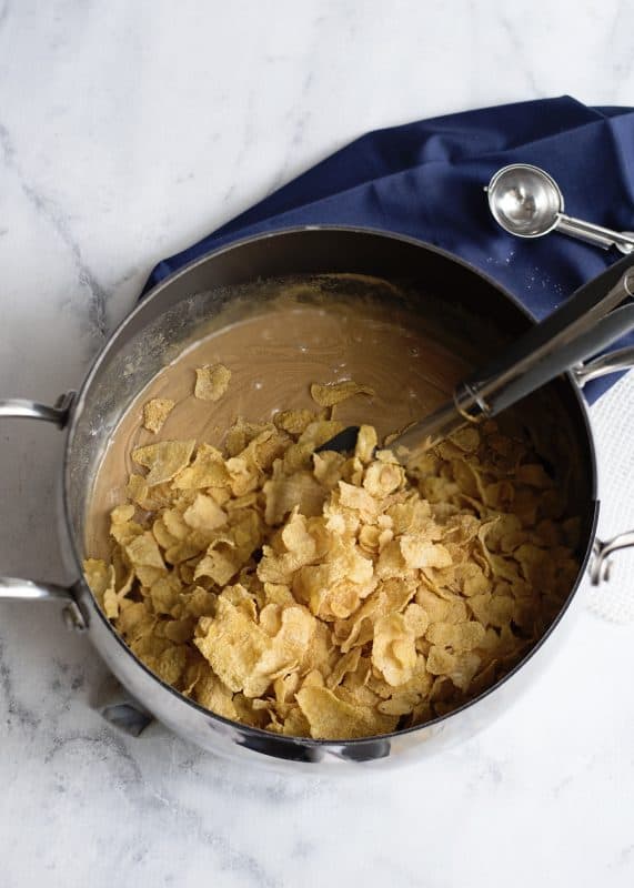 Pour in cornflakes and immediately stir until coated.