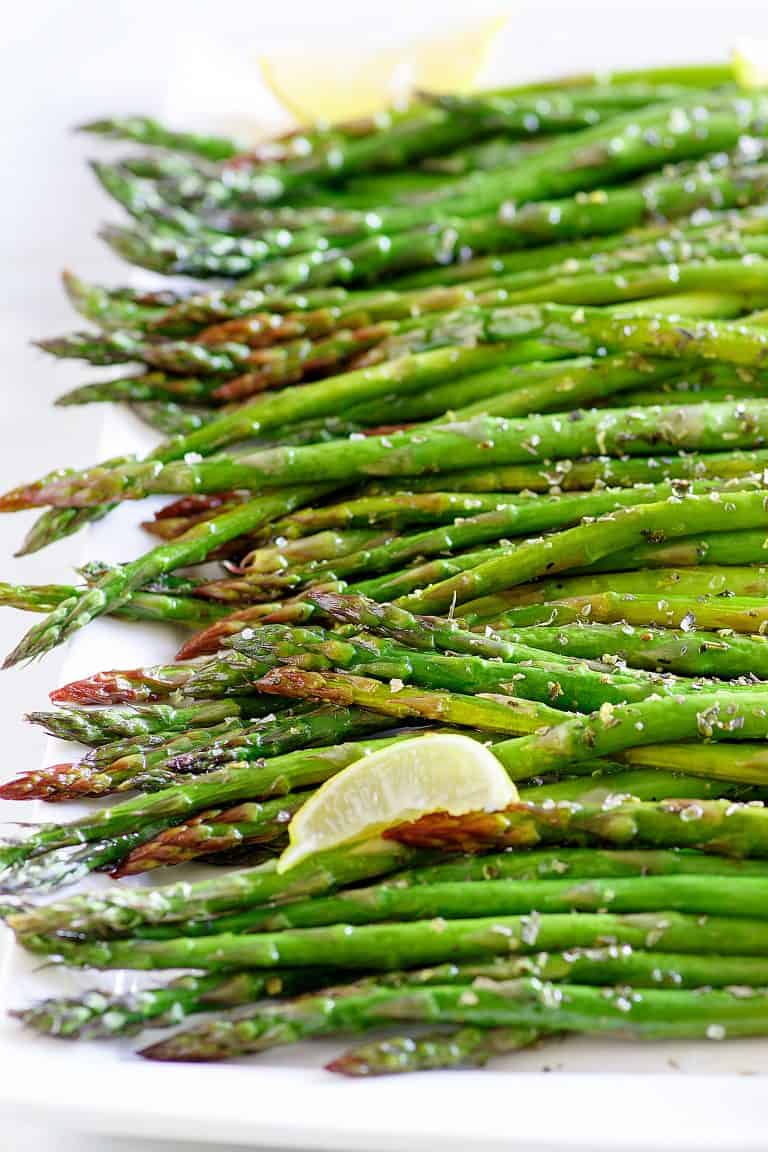 Close up of roasted asparagus with za'atar seasoning.