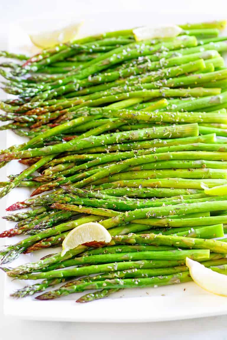 Platter of roasted asparagus with za'atar seasoning.