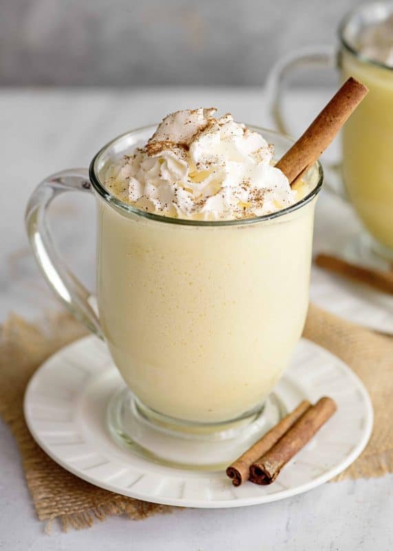 egg nog with cinnamon stick