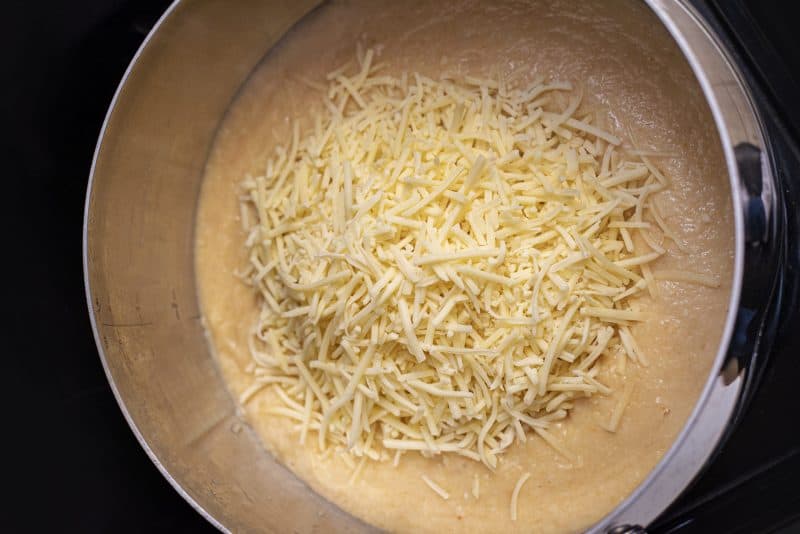 Return soup to pot and add cheese.