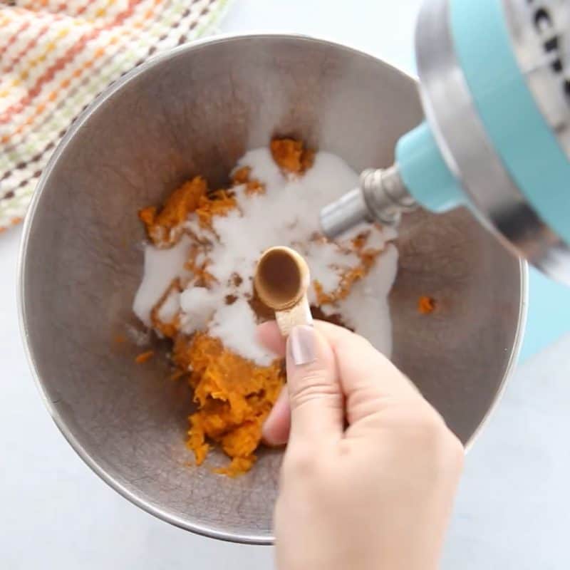 Place cinnamon, sugar, and sweet potatoes to mixing bowl.