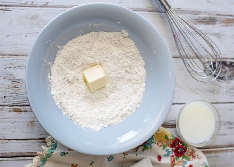 Combine dry ingredients and butter in a mixing bowl.
