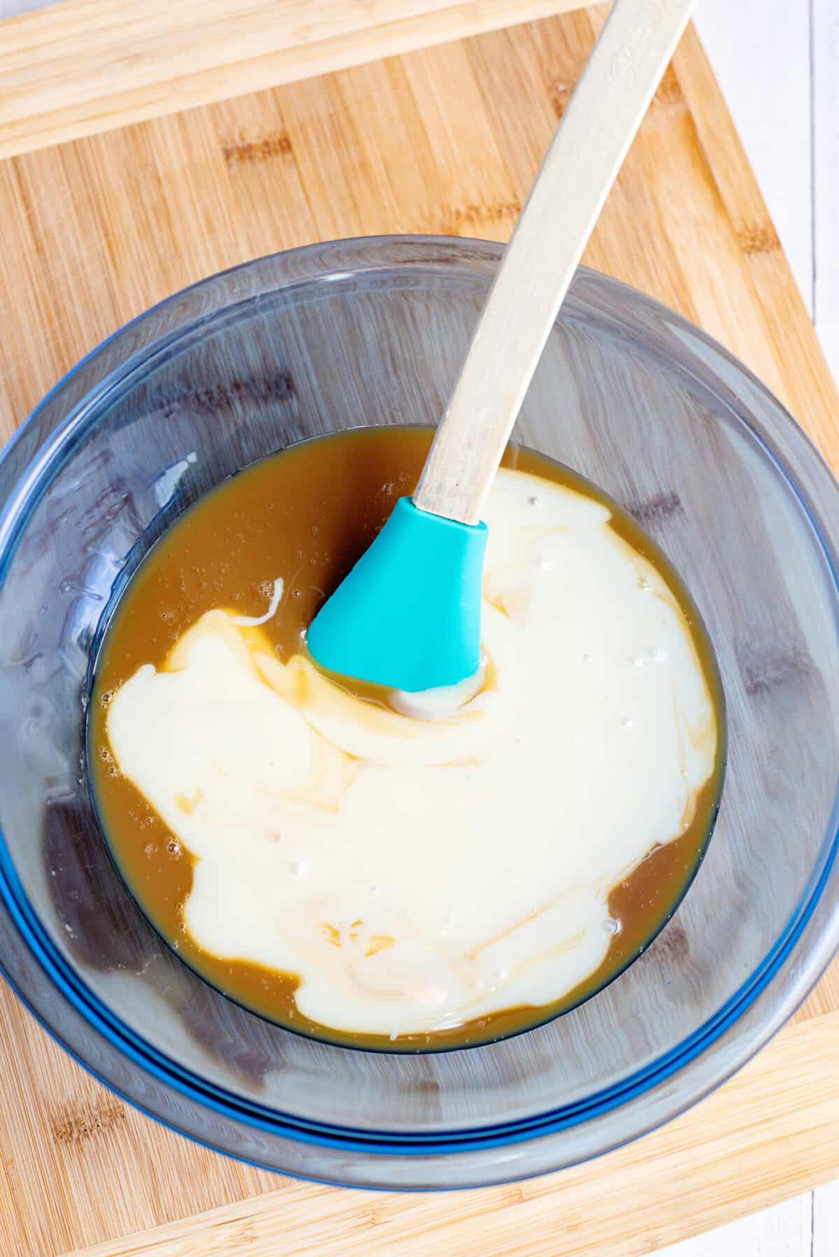 sweetened condensed milk and caramel mixed together