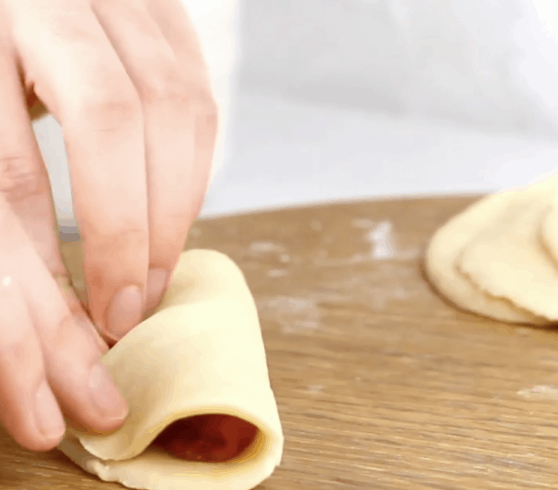 fold over the dough and press lightly around the edges to seal