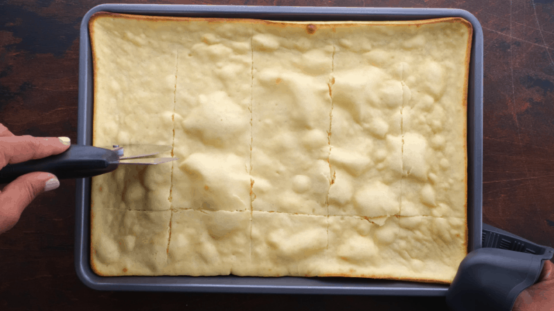 Use pizza cutter to cut bread into bite-sized pieces.