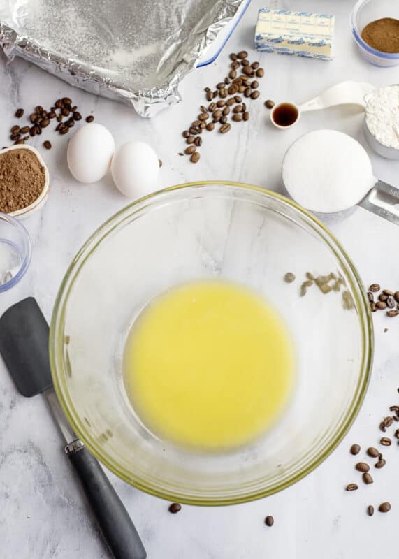 In a microwave-safe bowl, melt the butter in the microwave.