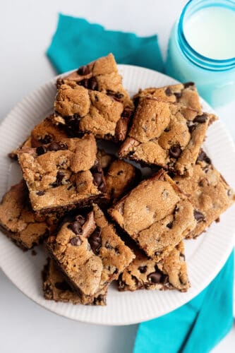 Plate filled with chocolate chip cheesecake bars