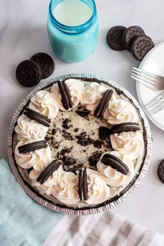 Mint Oreo Ice Cream Pie with whipped cream/Oreos on top