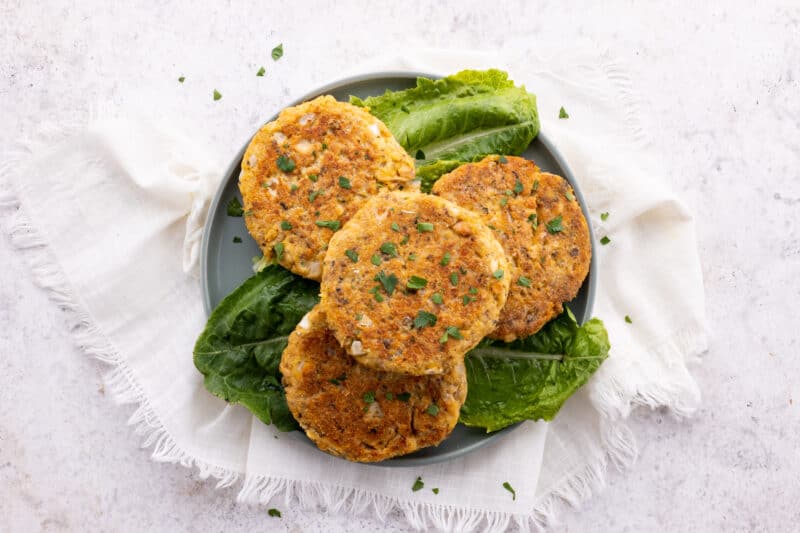 Stack of salmon patties on plate